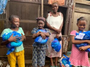 Children receive dry clothing