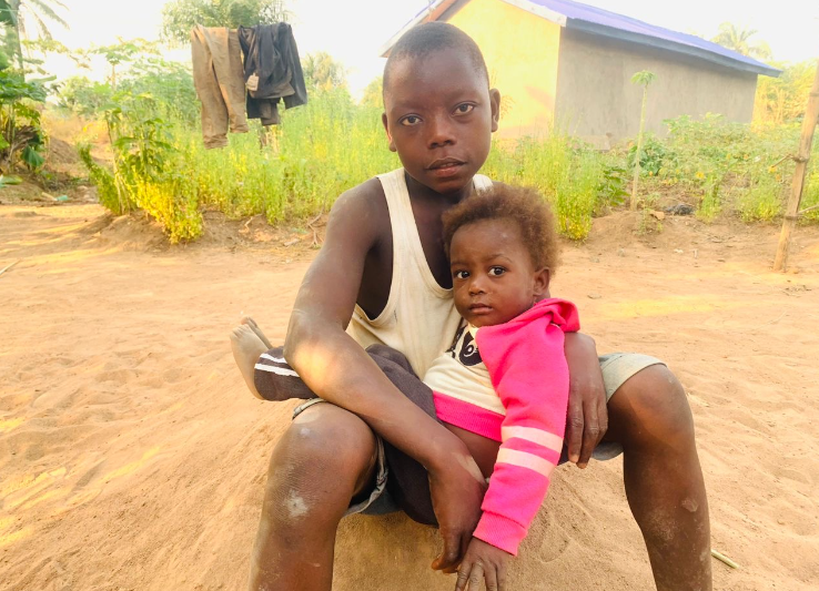 Abu cares for his two year old sister